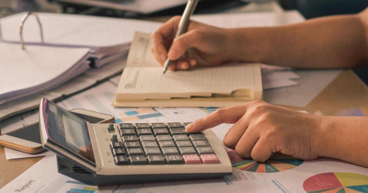 A calculator beside a calendar