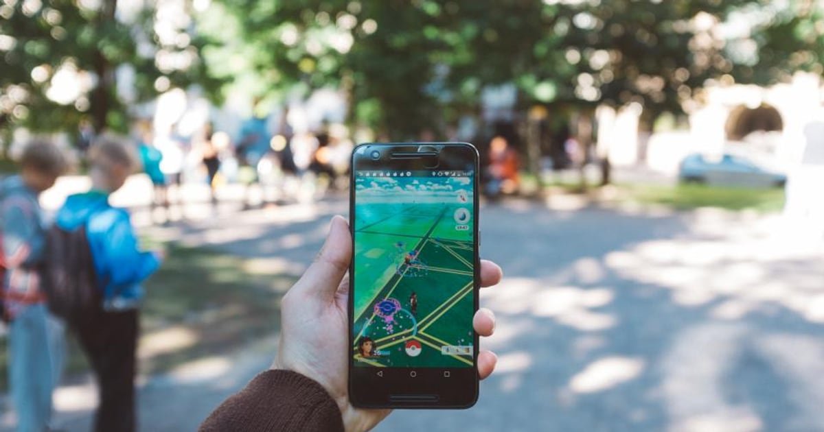 A mobile phone held in one hand
