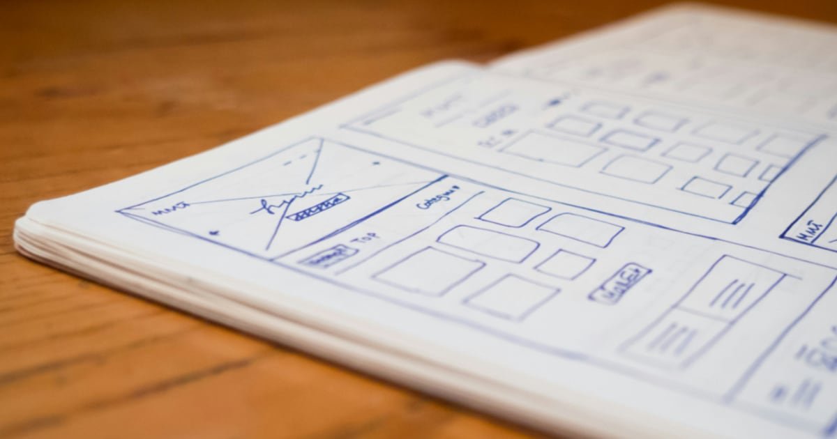 Wireframe sketches on a desk