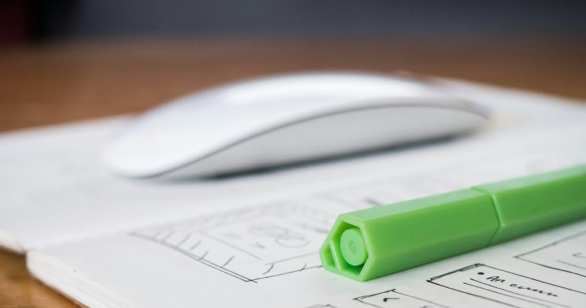 A wireframe sketched on paper